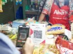 hadirkan-kemudahan-transaksi-nontunai-bank-dki-terapkan-digitalisasi-pembayaran-di-pasar-rumput_145314
